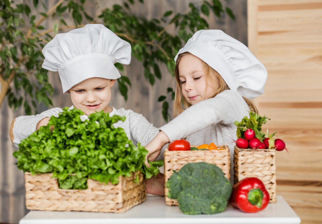 Kids cooking with vegetables